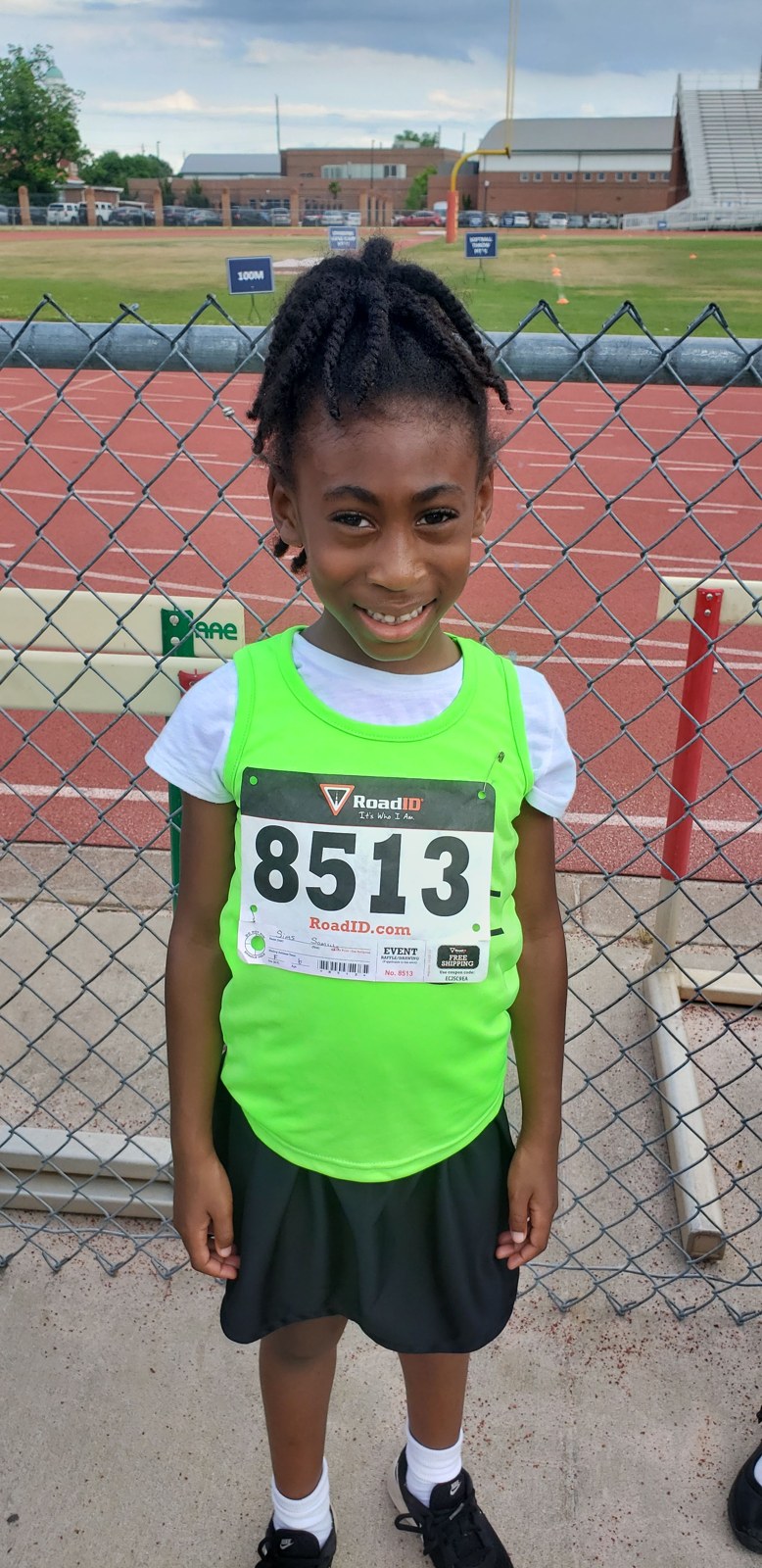 Samiya at the track in her youth team uniform